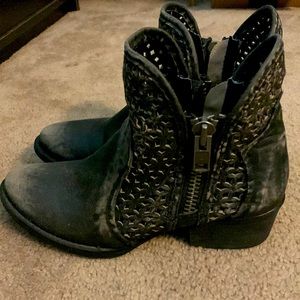 Black distressed leather ankle boots
